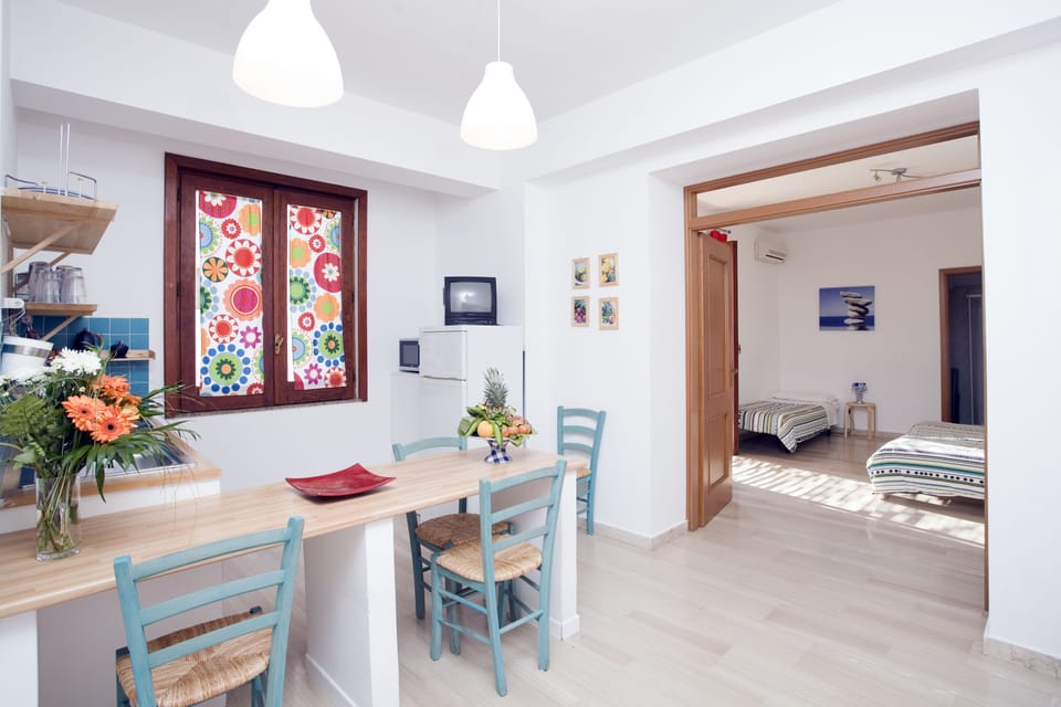 Apartment, 1 Bedroom | Premium bedding, individually decorated, iron/ironing board, free WiFi