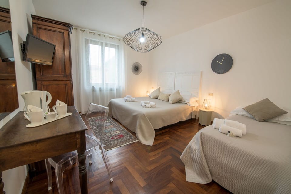 Double Room | Minibar, desk, laptop workspace, iron/ironing board