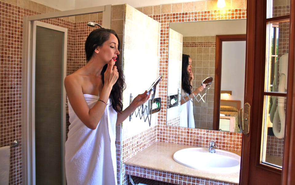 Shower, designer toiletries, hair dryer, bidet