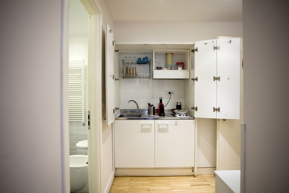 Superior Triple Room | Private kitchen | Fridge, espresso maker, coffee/tea maker, electric kettle