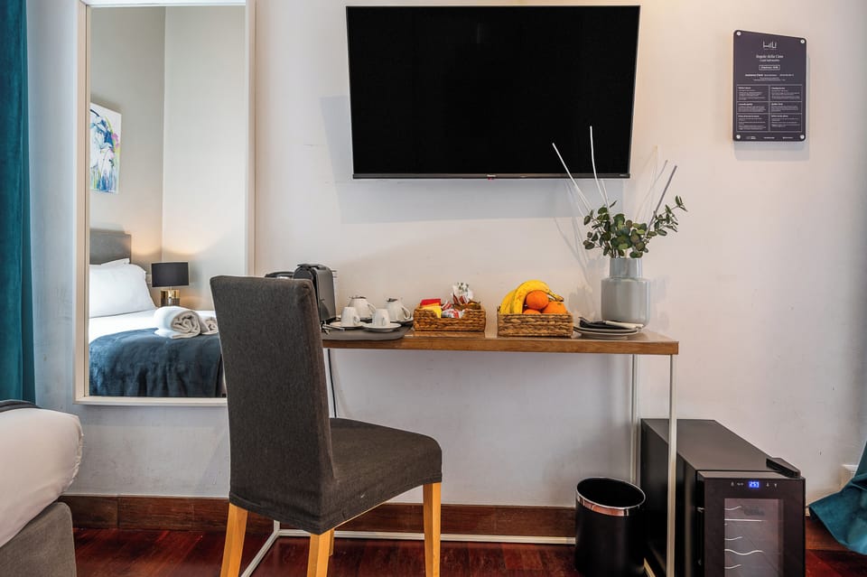 Family Quadruple Room | Premium bedding, minibar, in-room safe, desk