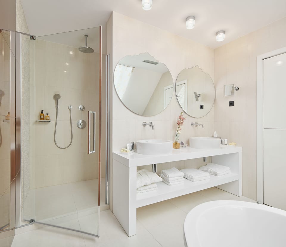 Premium Suite with Terrace and Old Town View | Bathroom amenities | Combined shower/tub, deep soaking tub, free toiletries, hair dryer