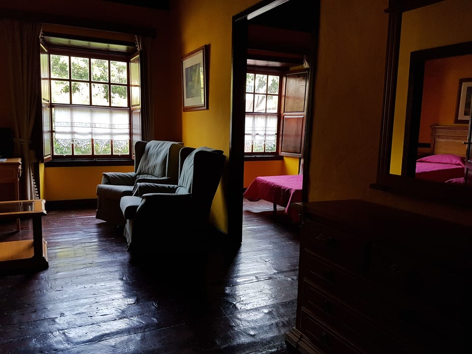 Triple Room | Living area | TV