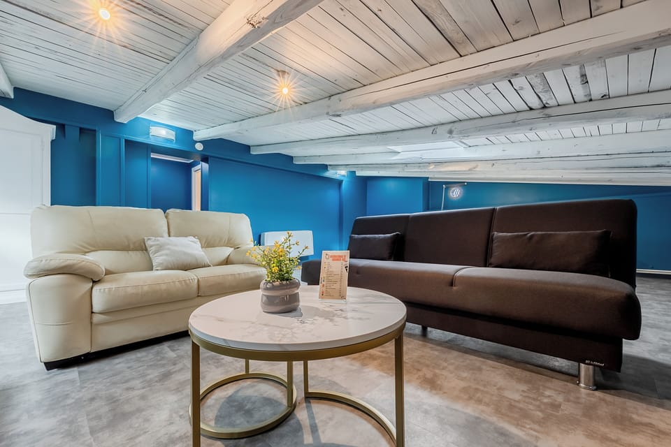 Superior Double Room | Living area | 22-inch flat-screen TV with satellite channels, TV