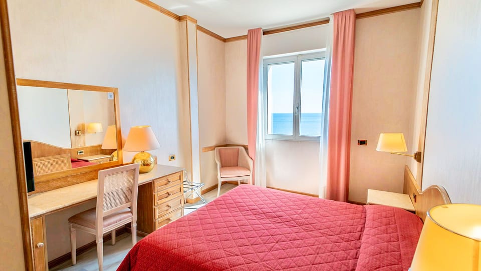 Double Room, Ocean View | In-room safe, desk, soundproofing, cribs/infant beds