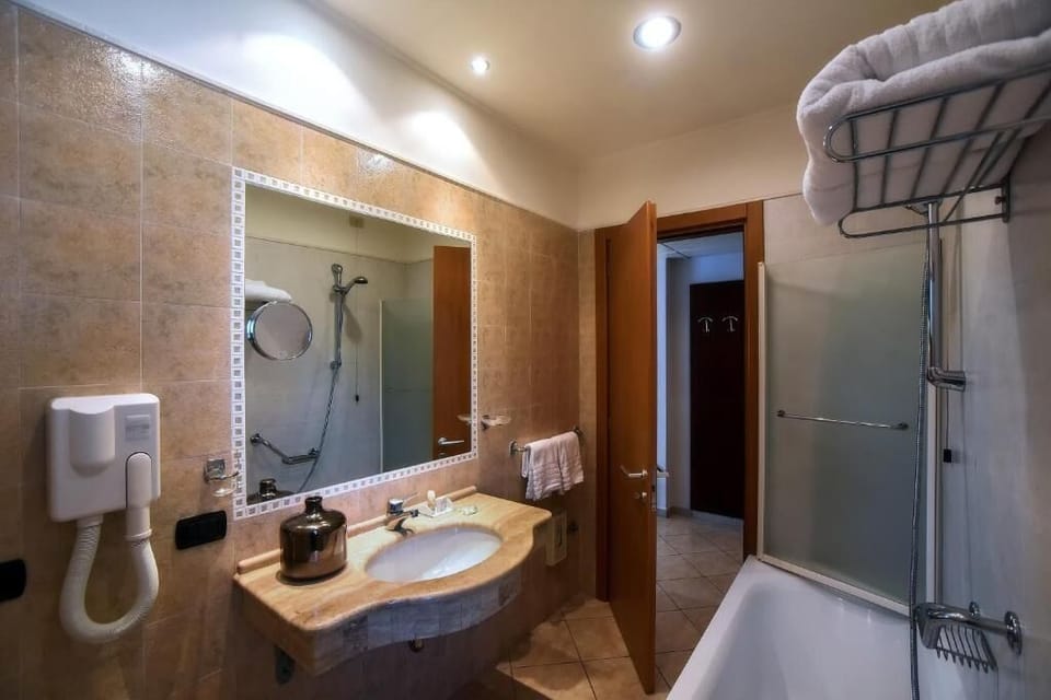 Family Quadruple Room, Balcony | Bathroom | Free toiletries, hair dryer, bidet, towels