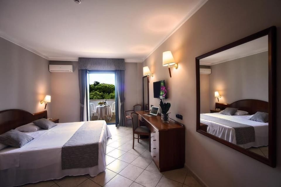 Classic Double Room, Balcony, Garden View | In-room safe, free WiFi, bed sheets