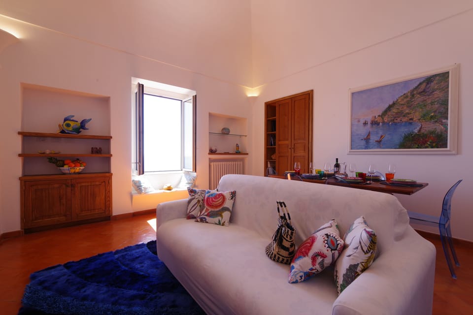 Apartment, Sea View, Annex Building | Living area | 55-cm TV with satellite channels, pay movies