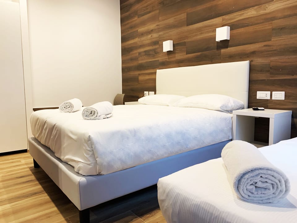 Triple Room | Premium bedding, in-room safe, cribs (free), WiFi (free)