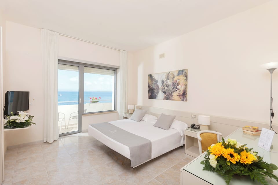 Superior Double Room, Sea View | Minibar, in-room safe, desk, free WiFi