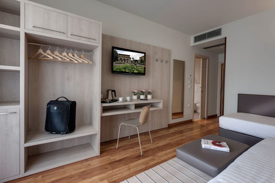 Superior Triple Room | Down comforters, in-room safe, desk, laptop workspace