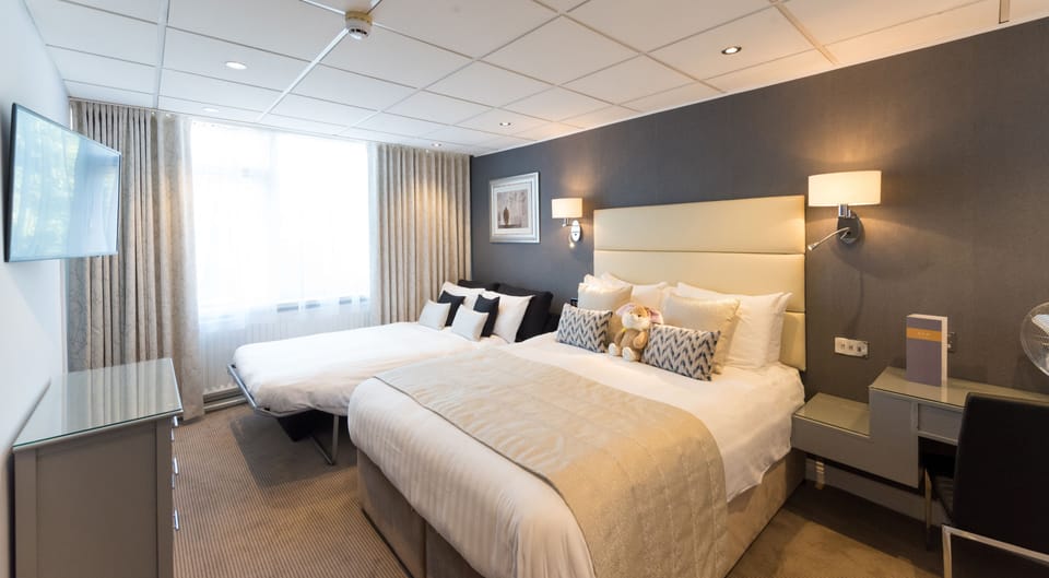 Family Room (2 Adults and 2 Children) | Hypo-allergenic bedding, desk, laptop workspace, iron/ironing board