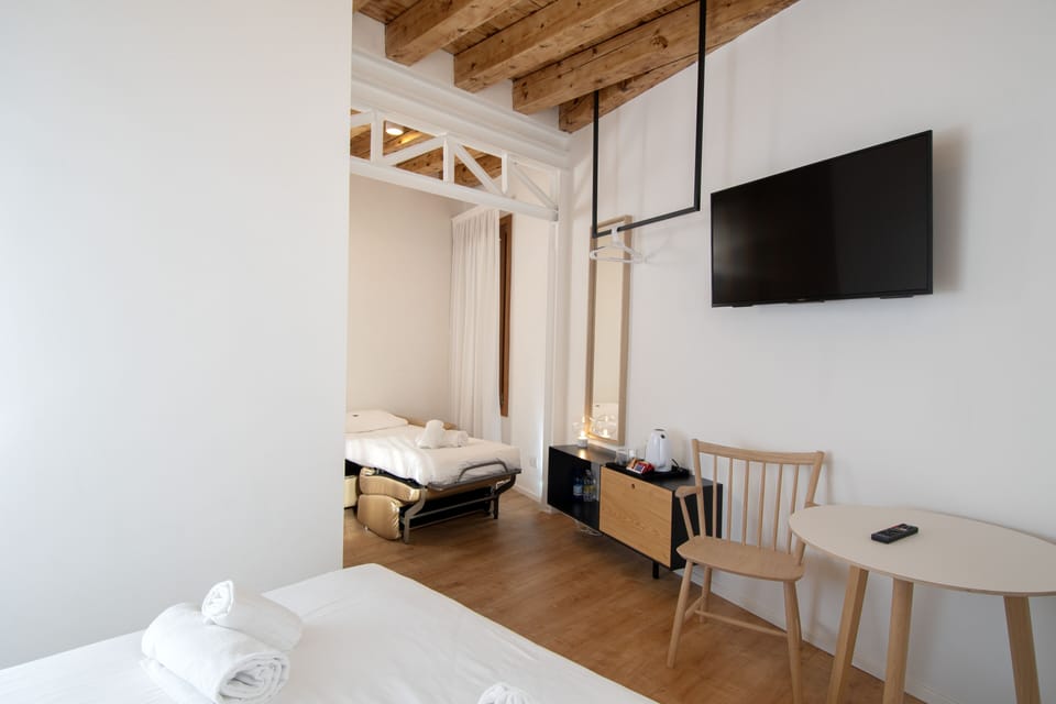 Triple Room | Premium bedding, down comforters, in-room safe, cribs/infant beds