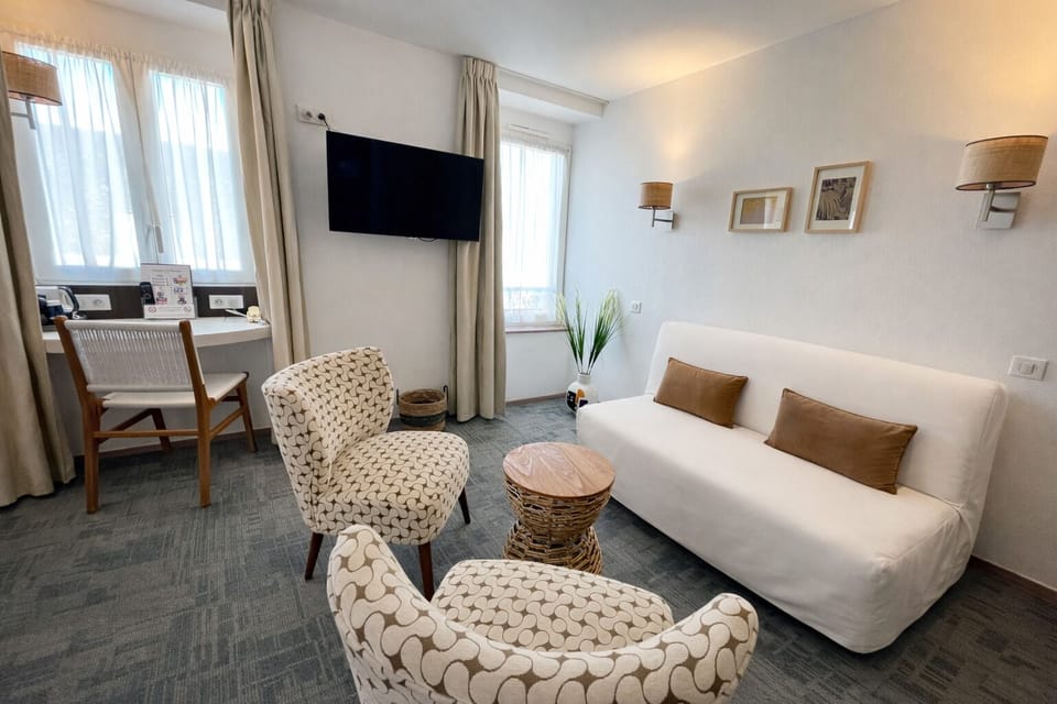 Deluxe Quadruple Room | Premium bedding, pillowtop beds, in-room safe, desk