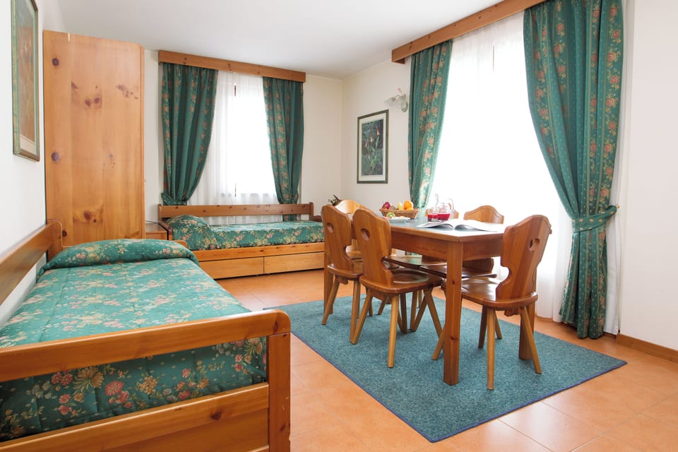 Family Room, Mountain View | Minibar, in-room safe, desk, laptop workspace