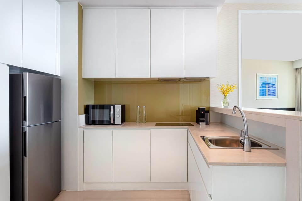 Fridge, microwave, stovetop, coffee/tea maker