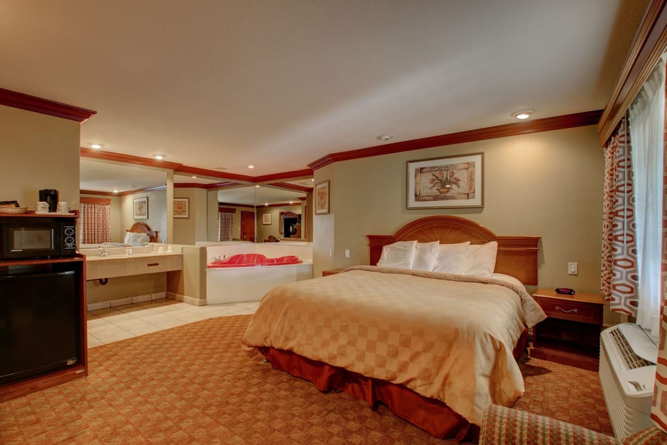 Suite, 1 Bedroom | Living area | TV