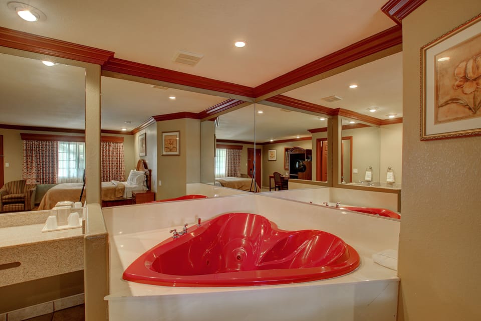 Suite, 1 King Bed, Jetted Tub | Premium bedding, pillowtop beds, individually decorated