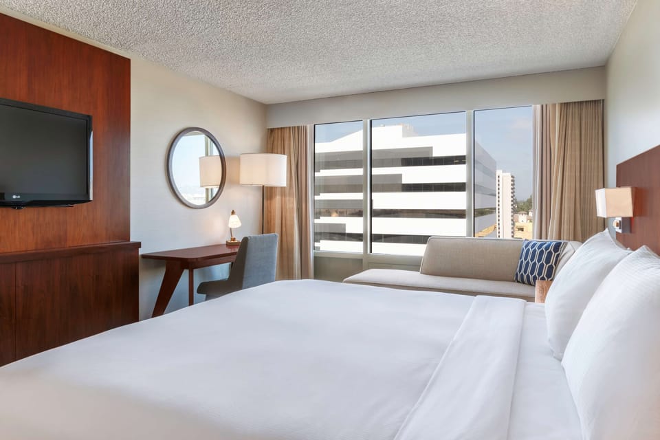 Premium bedding, down comforters, pillowtop beds, in-room safe