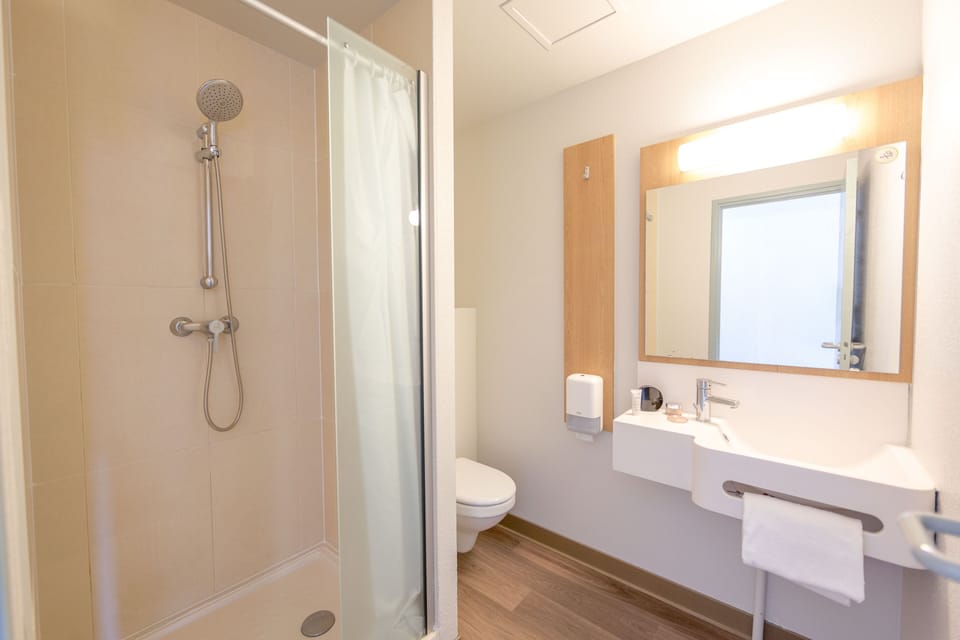 Shower, free toiletries, hair dryer, towels