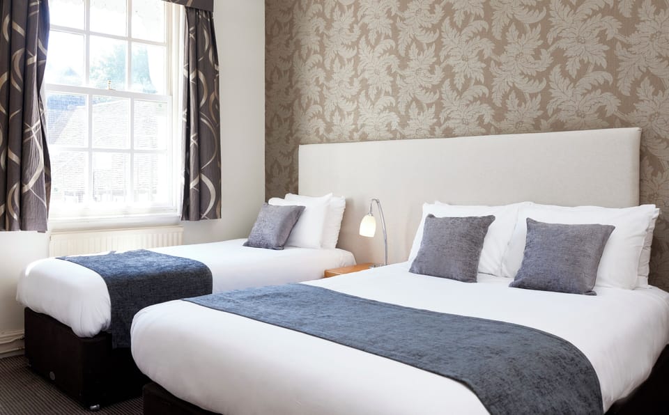 Family Room | Desk, iron/ironing board, free WiFi, bed sheets