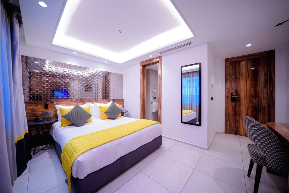 Premium bedding, down comforters, Select Comfort beds, minibar