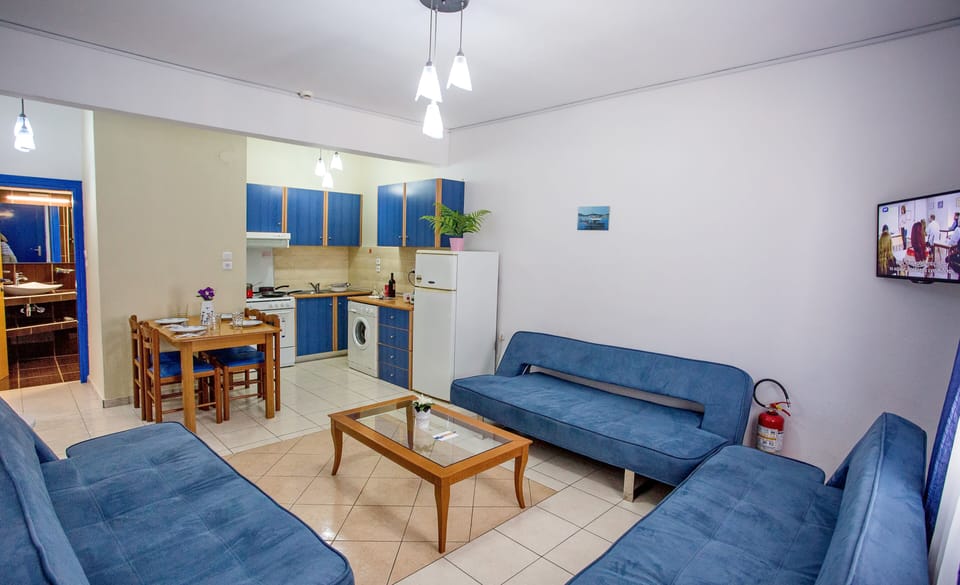 Apartment (5 Adults) | Living area | 32-inch flat-screen TV with digital channels, TV