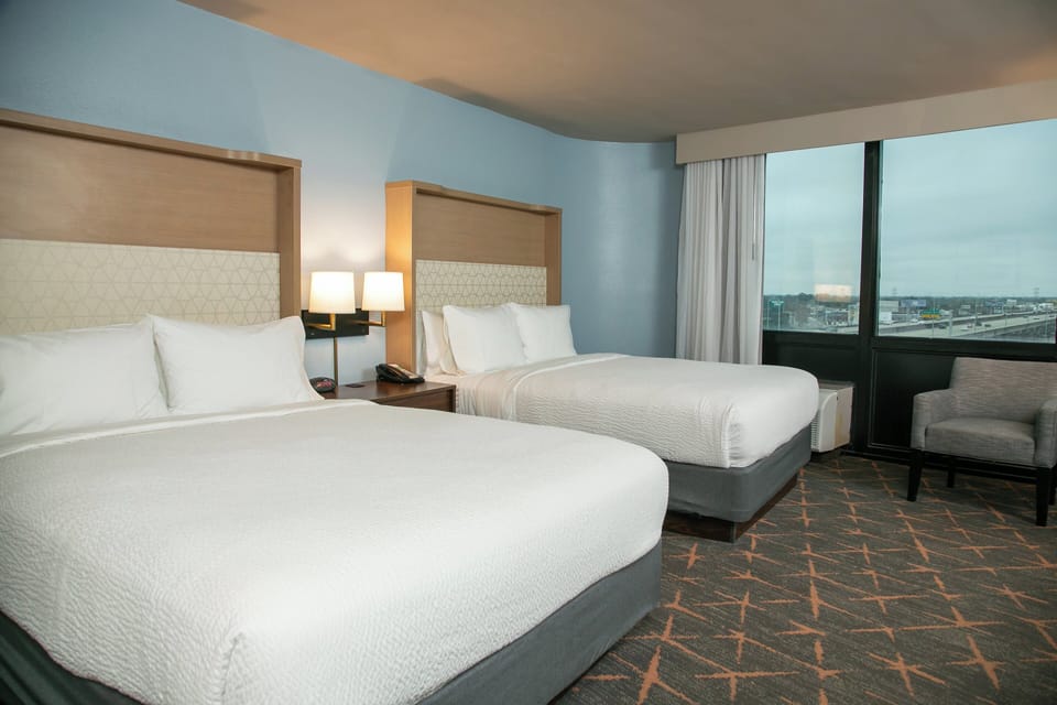 Standard Room, 2 Queen Beds | In-room safe, desk, laptop workspace, blackout drapes