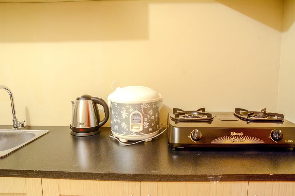Standard Apartment, 3 Bedrooms | Private kitchenette | Fridge, stovetop, electric kettle, rice cooker