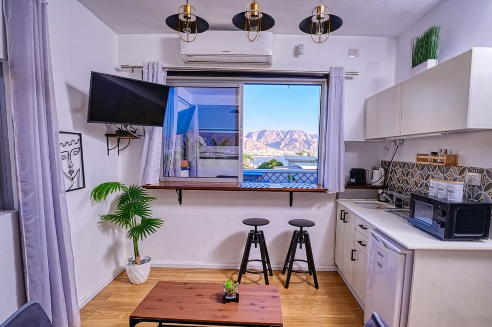 studio with panoramic sea view | Private kitchenette | Fridge, microwave, stovetop, espresso maker
