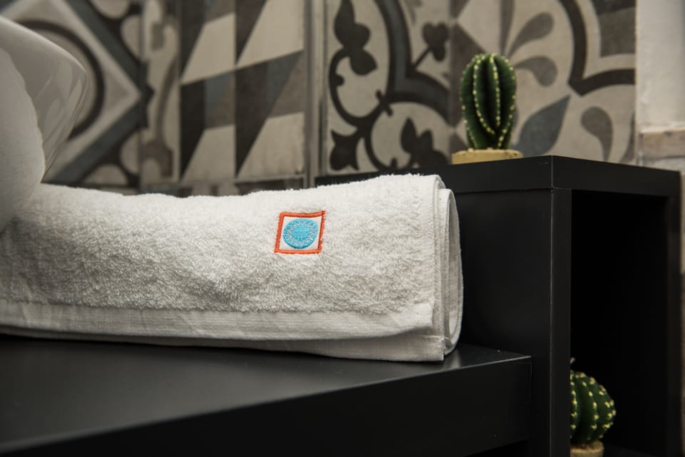 Deluxe Double or Twin Room | Bathroom | Shower, hair dryer, bidet, towels