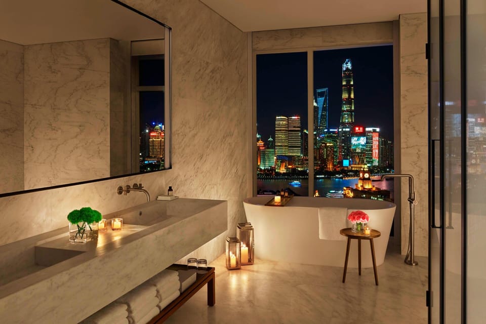Bund View Terrace Suite | Bathroom | Separate tub and shower, deep soaking tub, rainfall showerhead
