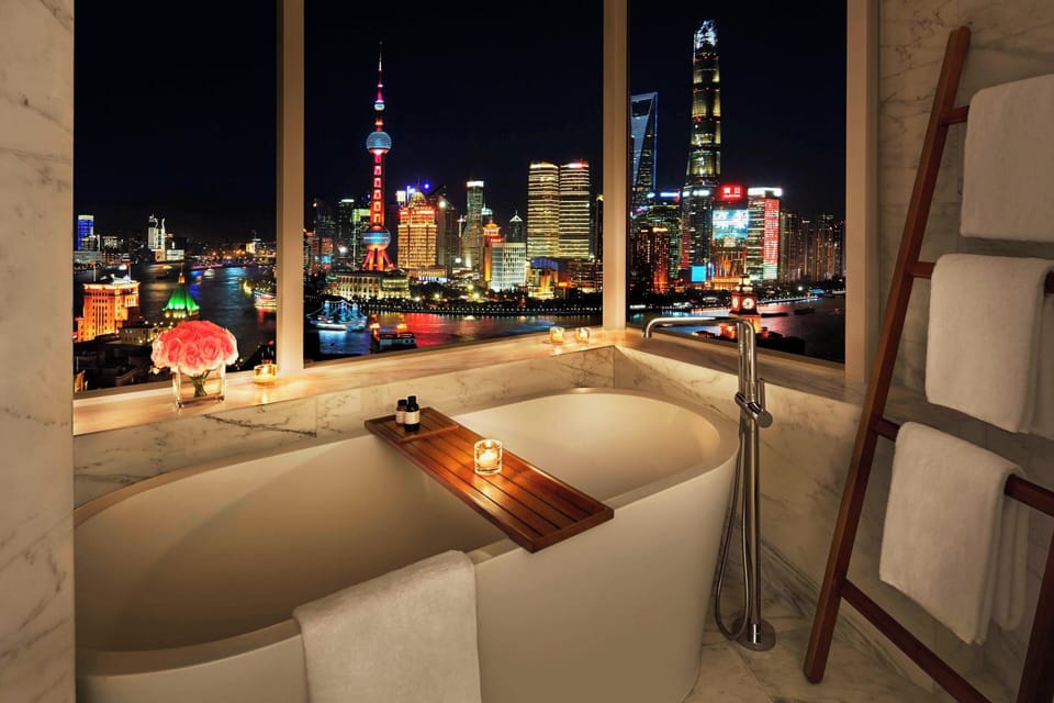 Bund View Suite | Bathroom | Separate tub and shower, deep soaking tub, rainfall showerhead