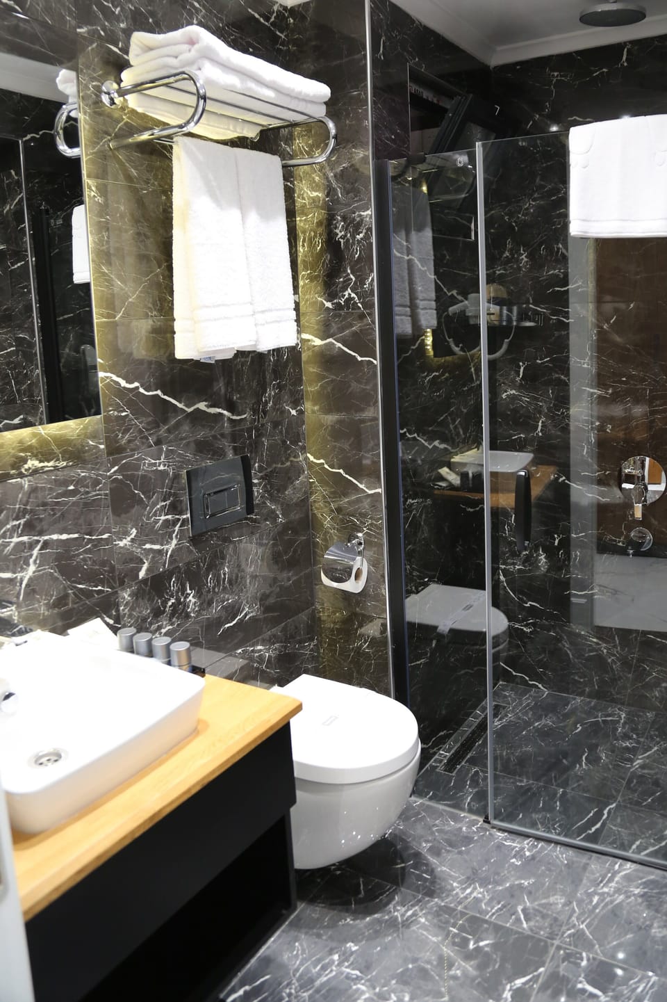 Shower, eco-friendly toiletries, hair dryer, bathrobes