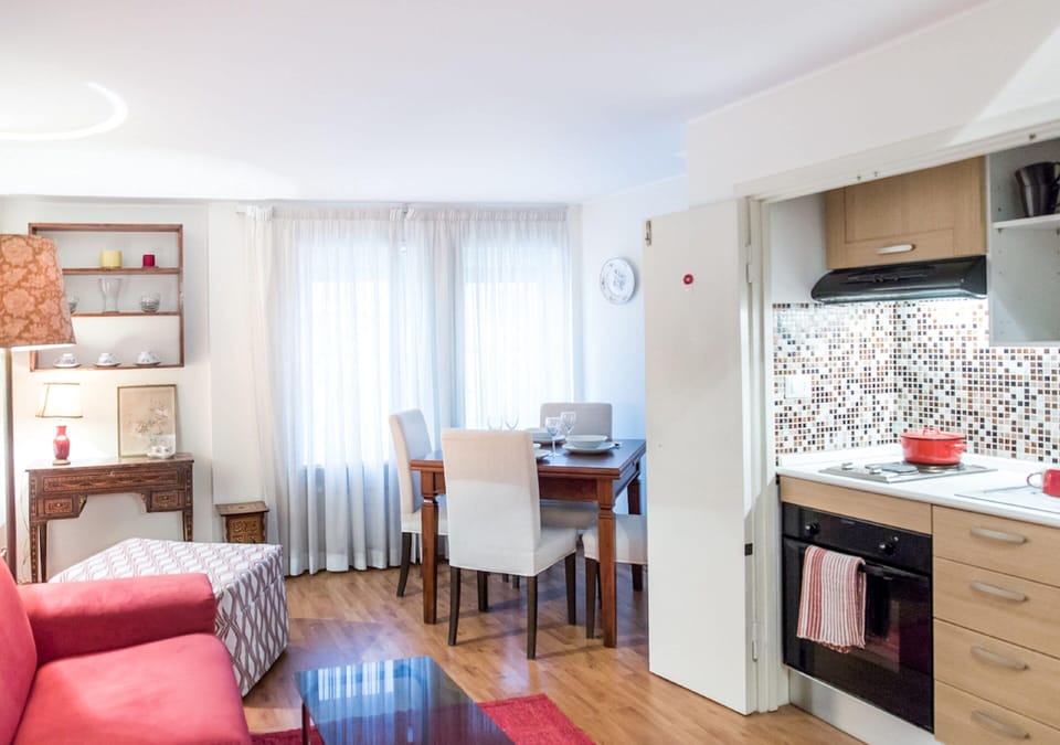 Standard Duplex, 1 Bedroom | Living area | Flat-screen TV