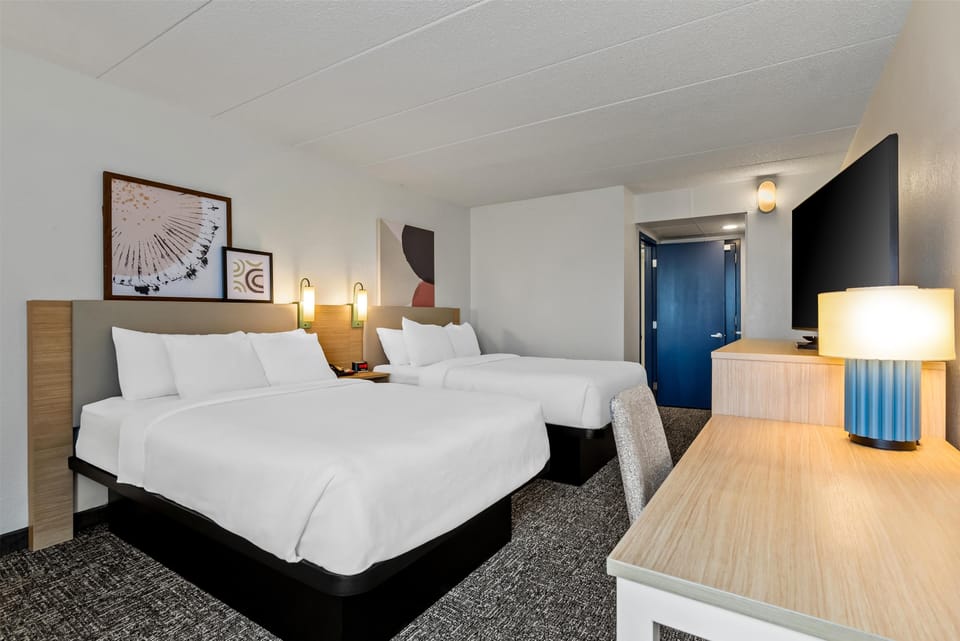 Room, 2 Double Beds | Iron/ironing board, free cribs/infant beds, rollaway beds, free WiFi