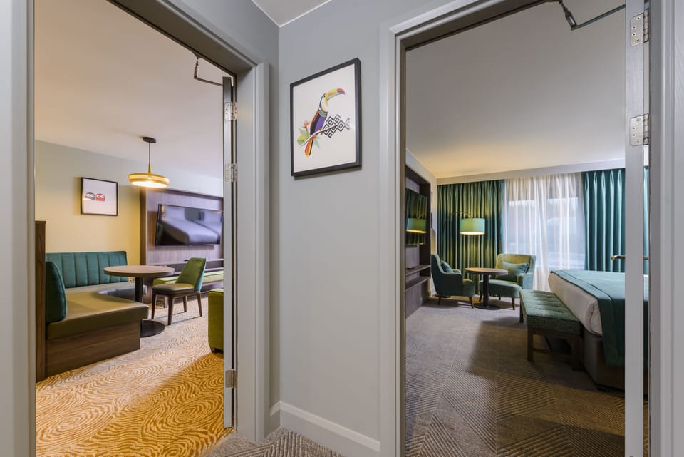 Individually decorated, desk, laptop workspace, iron/ironing board