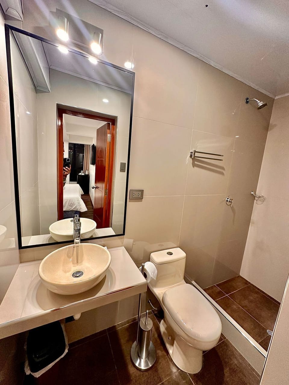 Shower, rainfall showerhead, hair dryer, towels