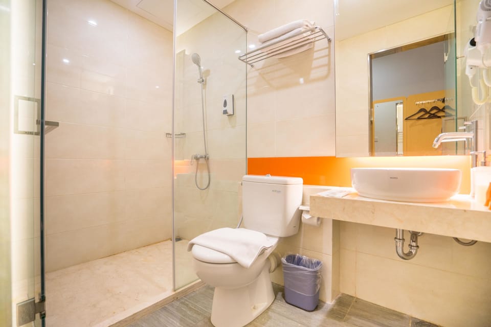 Shower, free toiletries, hair dryer, slippers