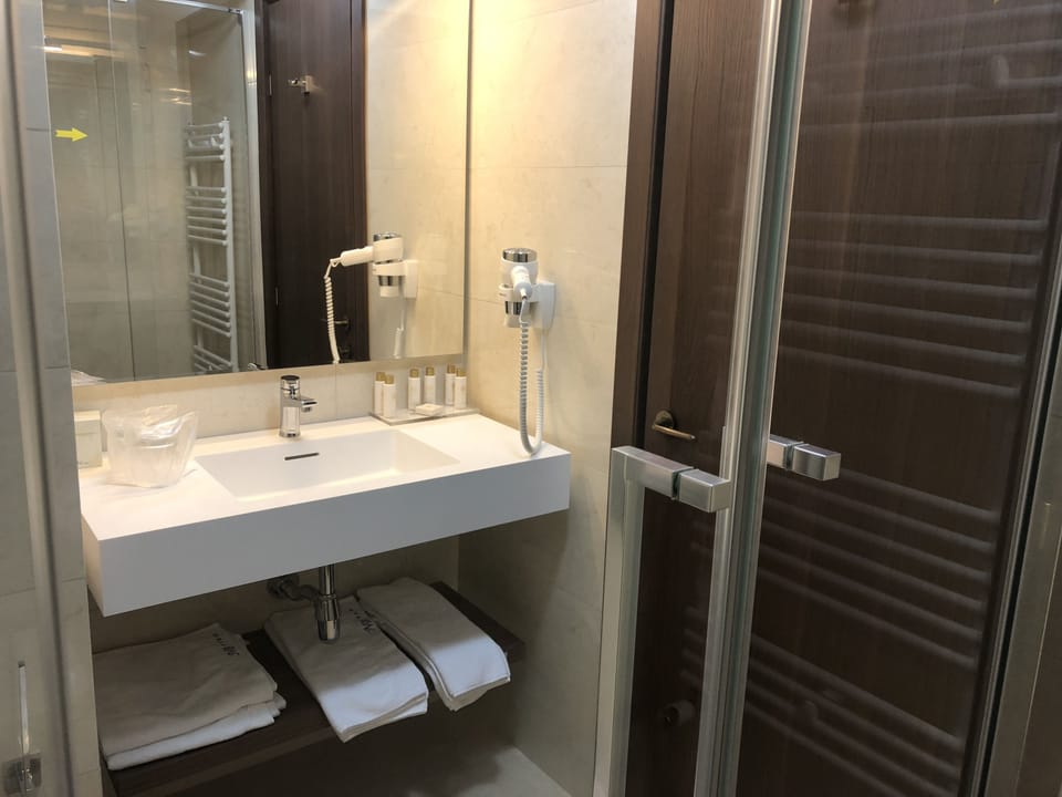 Shower, free toiletries, hair dryer, bathrobes