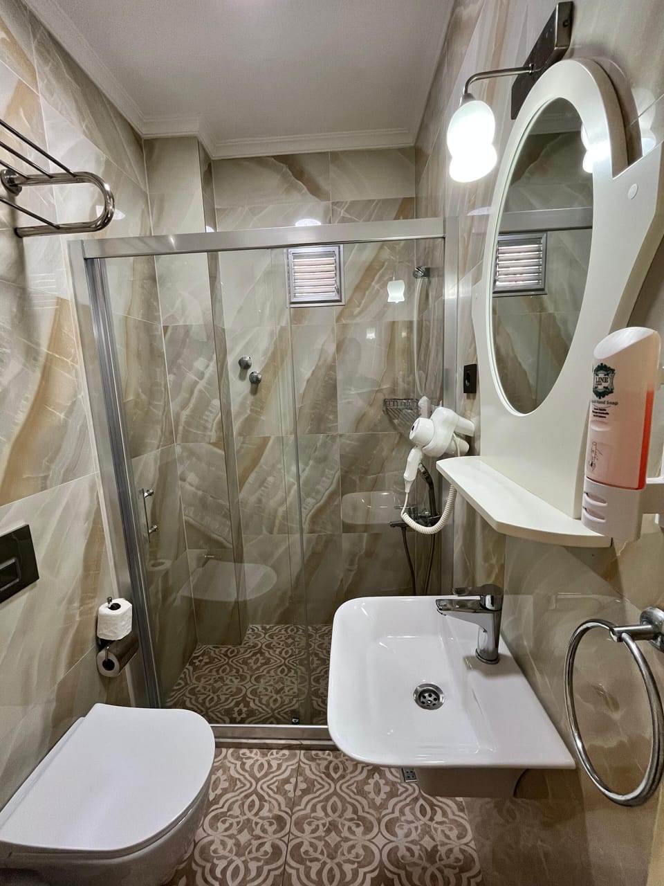 Standard Room | Bathroom | Shower, hair dryer, slippers