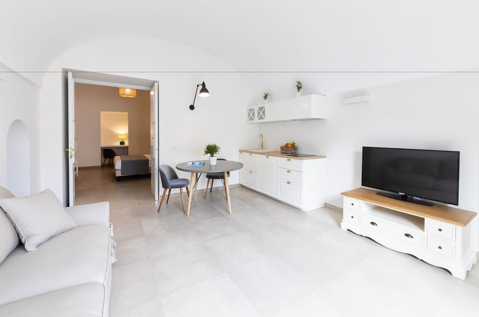Quadruple Room, Non Smoking | In-room safe, free WiFi, bed sheets