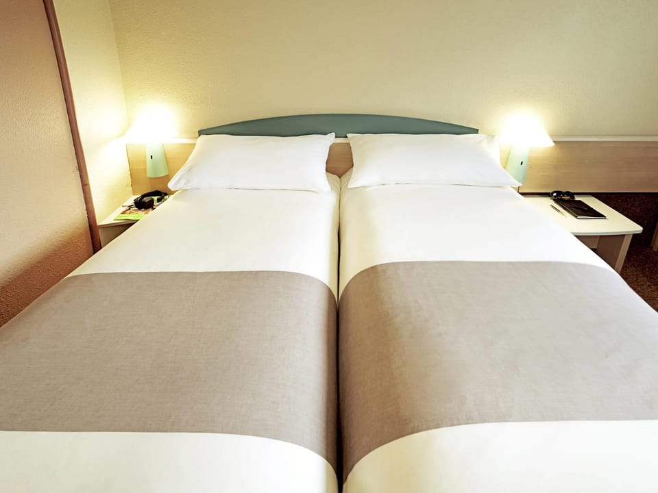 Standard Room, 2 Twin Beds | Desk, blackout drapes, iron/ironing board, free cribs/infant beds