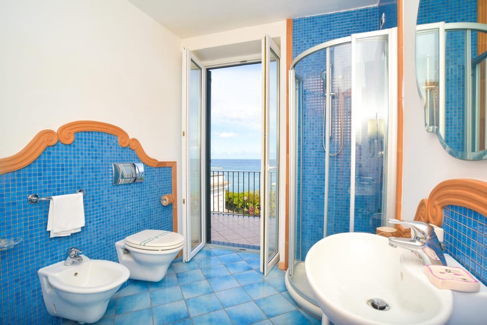 Shower, free toiletries, hair dryer, bathrobes