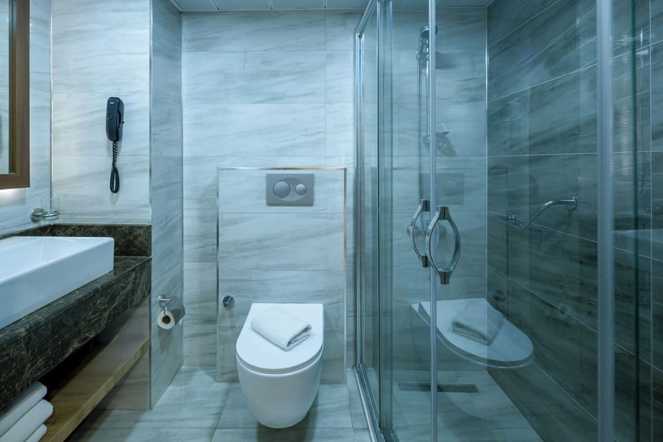 Family Room, Balcony | Bathroom | Shower, free toiletries, hair dryer, slippers