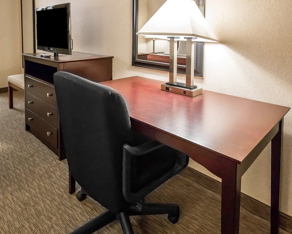 Desk, laptop workspace, blackout drapes, soundproofing