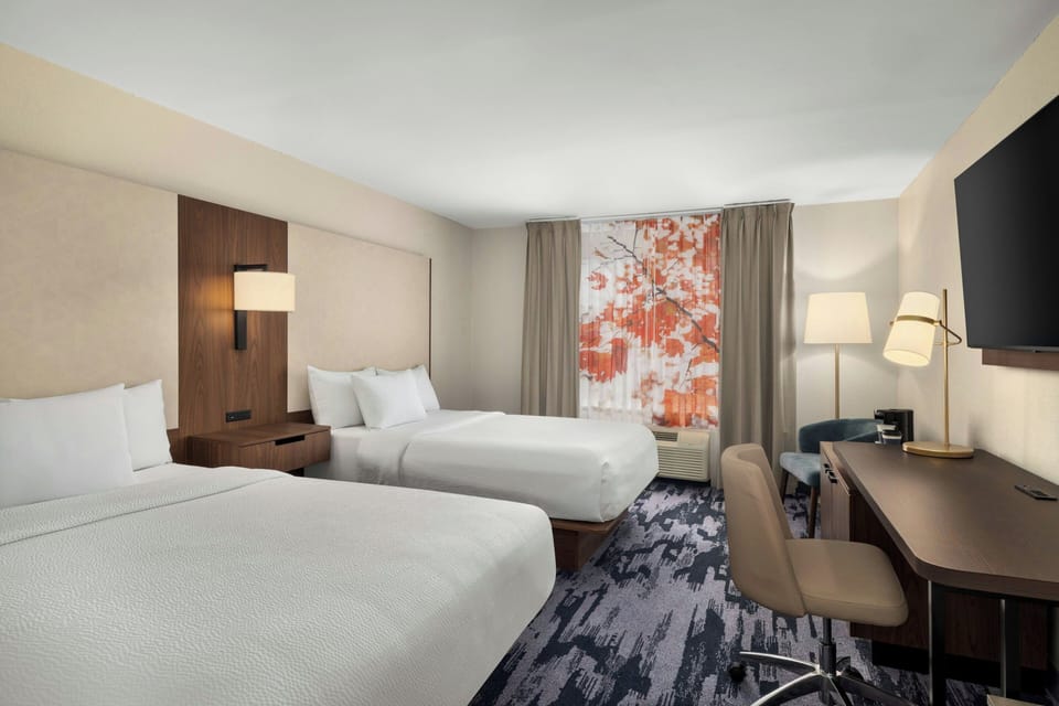 Room, 2 Double Beds | In-room safe, desk, laptop workspace, blackout drapes