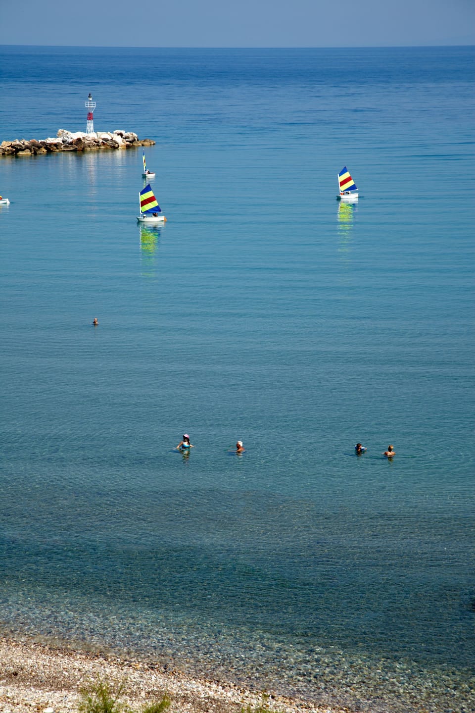 On the beach, sun loungers, beach umbrellas, beach towels