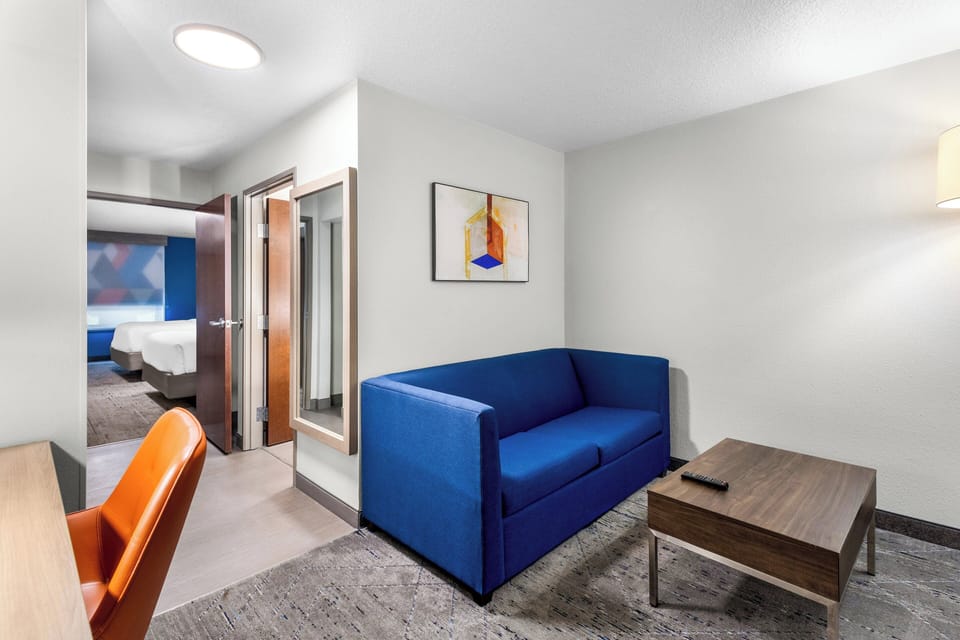 Suite, 2 Queen Beds | Desk, iron/ironing board, free cribs/infant beds, rollaway beds