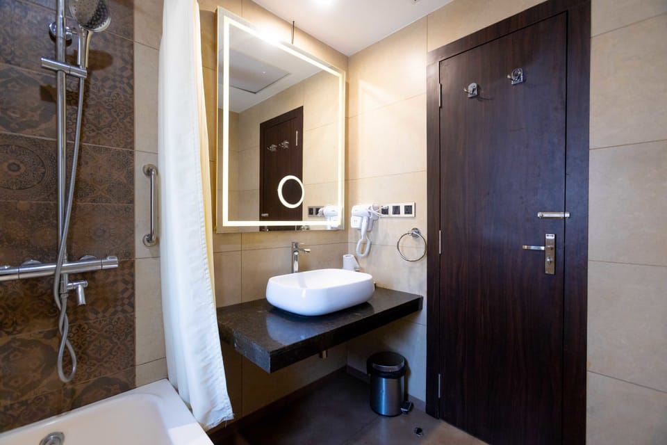 Suite, 1 Bedroom | Bathroom | Shower, free toiletries, hair dryer, slippers